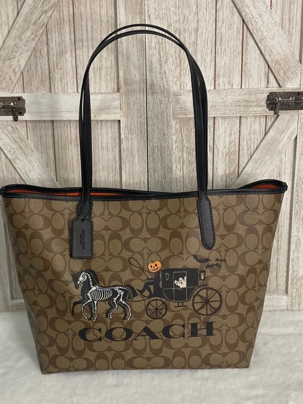 Coach Brown Signature Canvas Tote with Black Handles and Halloween Motif - Picture 1 of 3